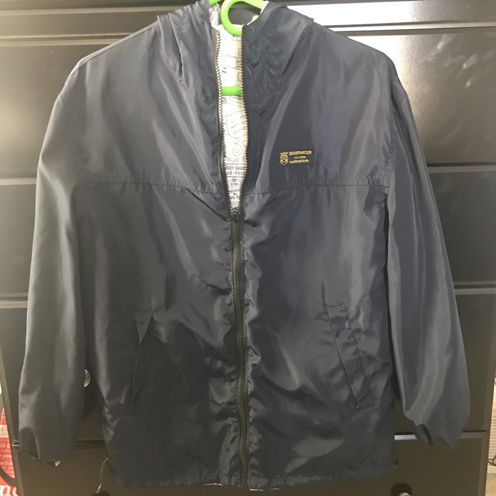 Reversible zip-up jacket.